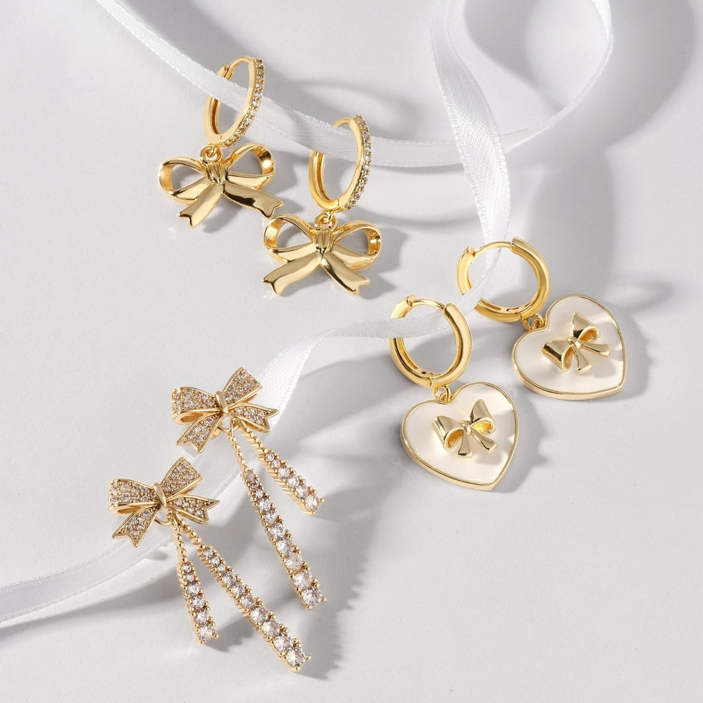 Pavé Huggies with Bow