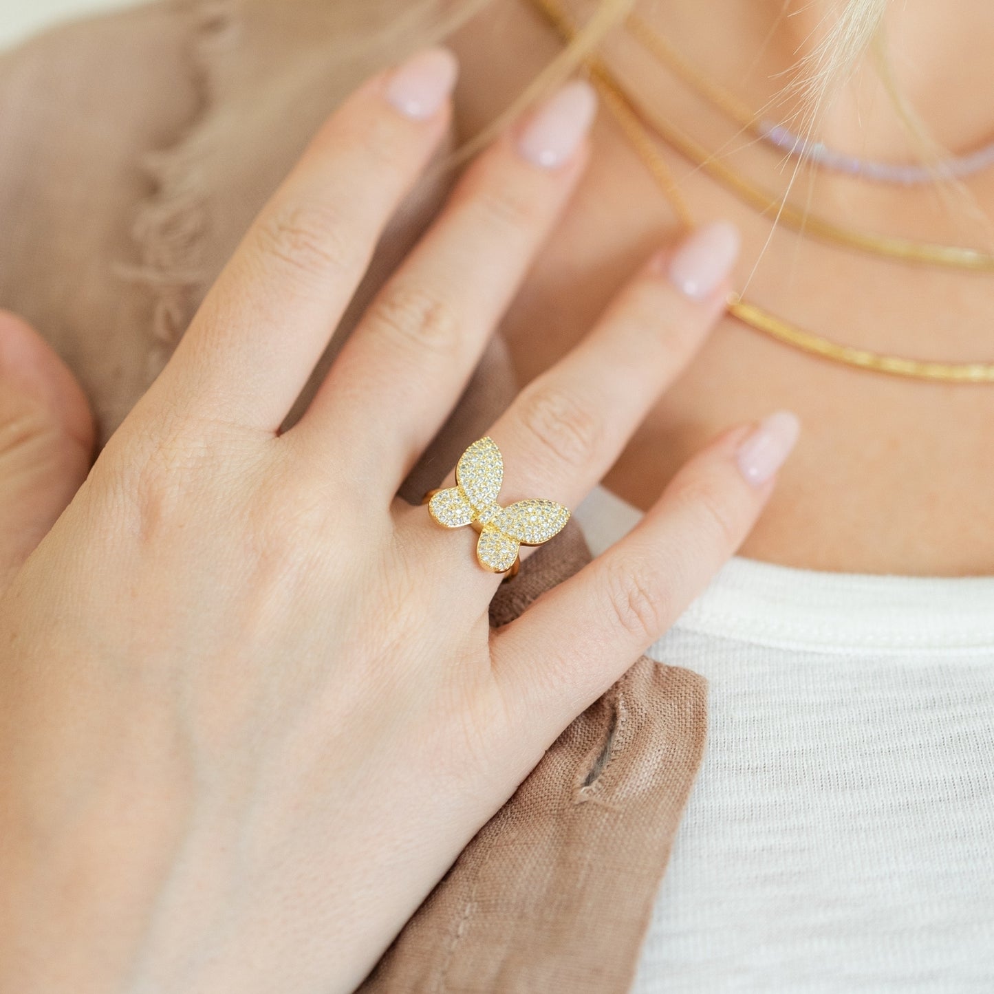 Stronger than Before, Butterfly Statement Ring