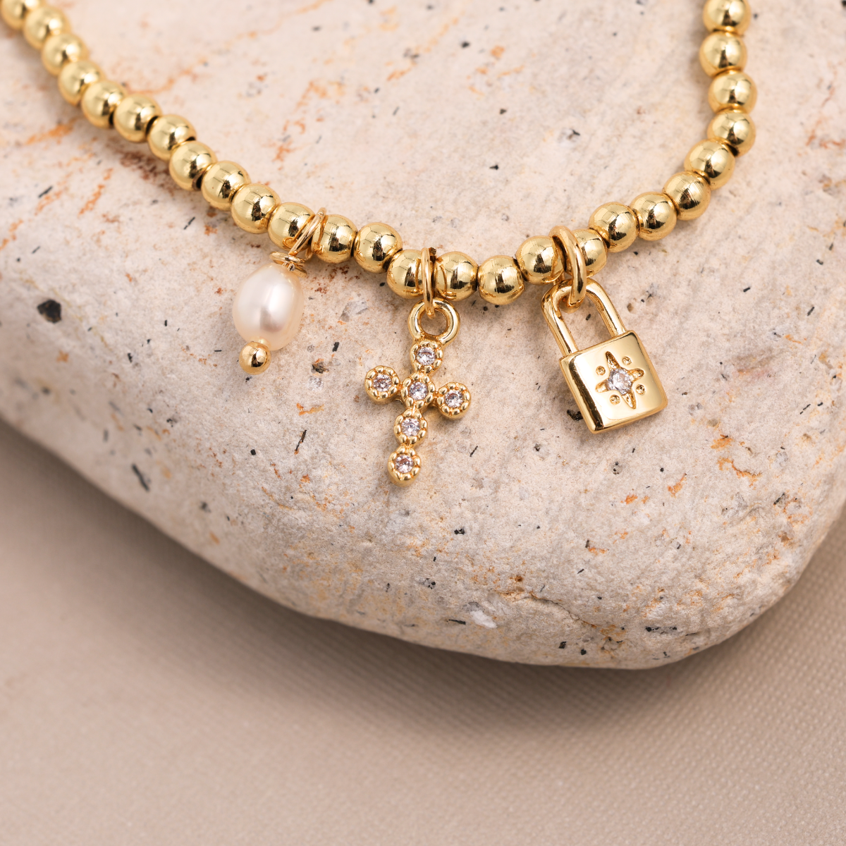 The Devotion Lock and Cross Bracelet
