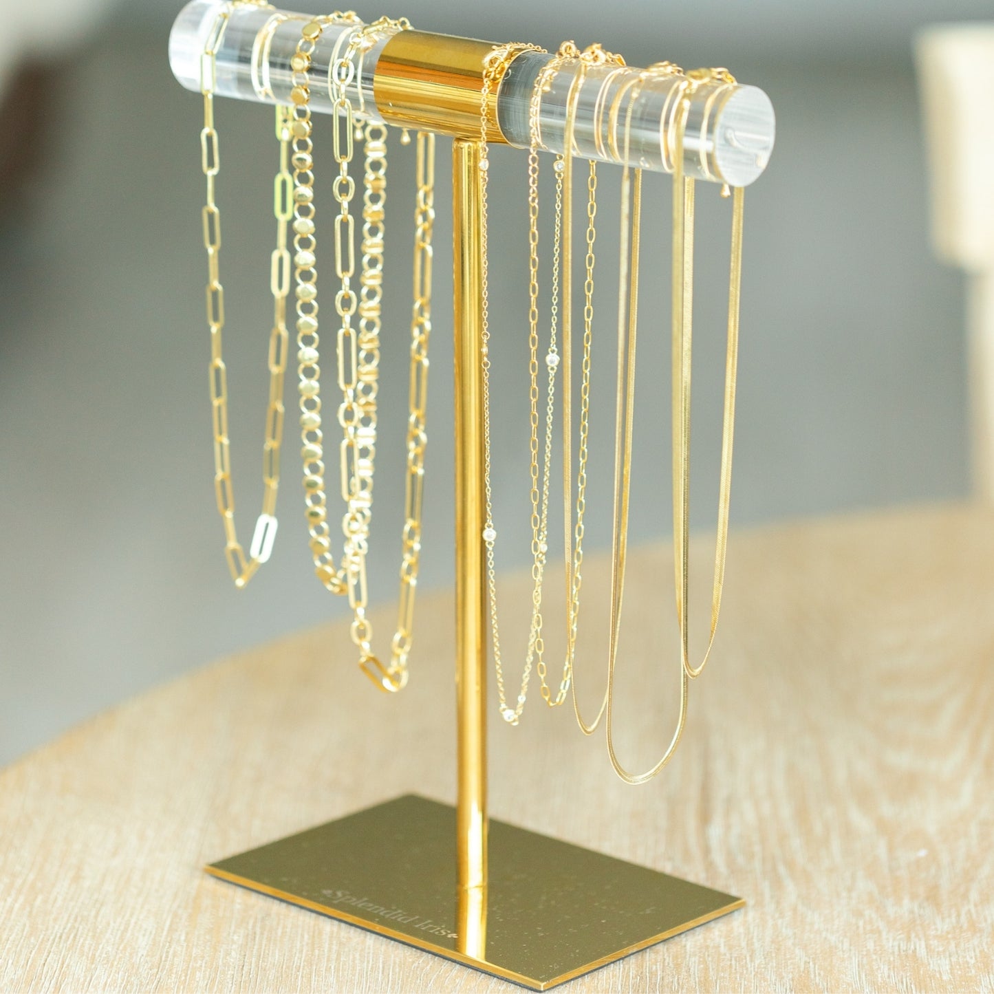 Branded Clear and Gold Display Bar