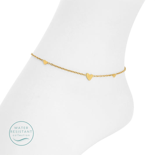 Gold anklet with heart-shaped charms on a white background