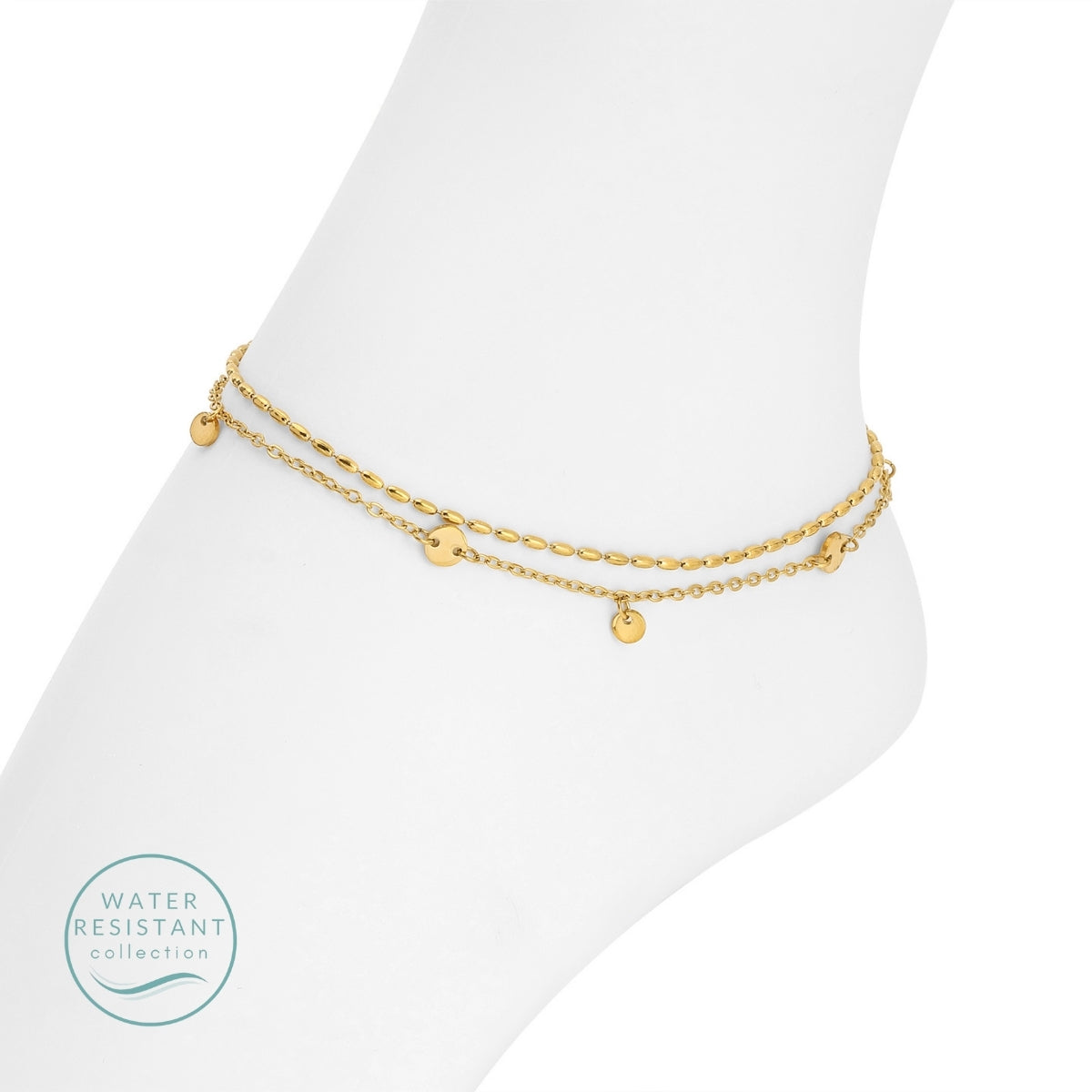 Gold anklets on a white foot with 'Water Resistant' collection label.