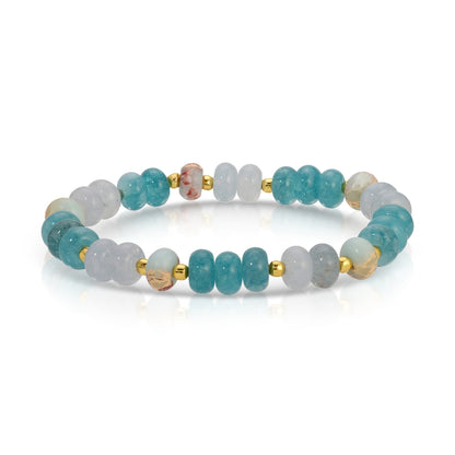 Beaded bracelet with turquoise, white, and gold beads on a white background