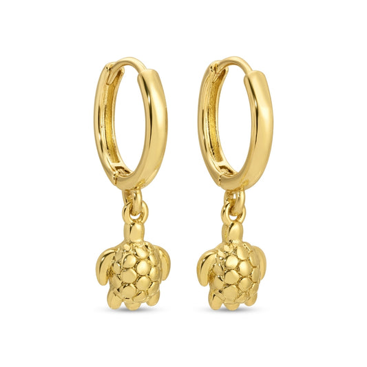 Gold hoop earrings with turtle charms on a white background