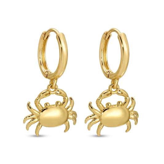 Gold crab-shaped earrings on a white background