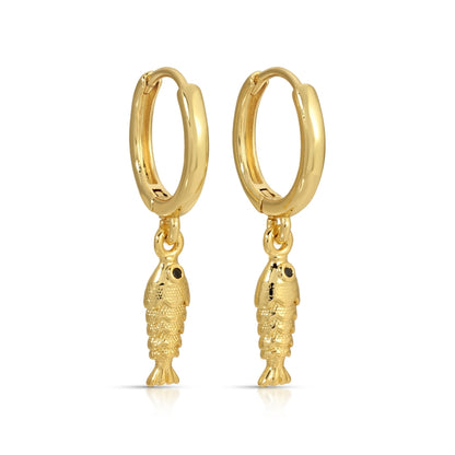 Gold hoop earrings with fish charms on a white background