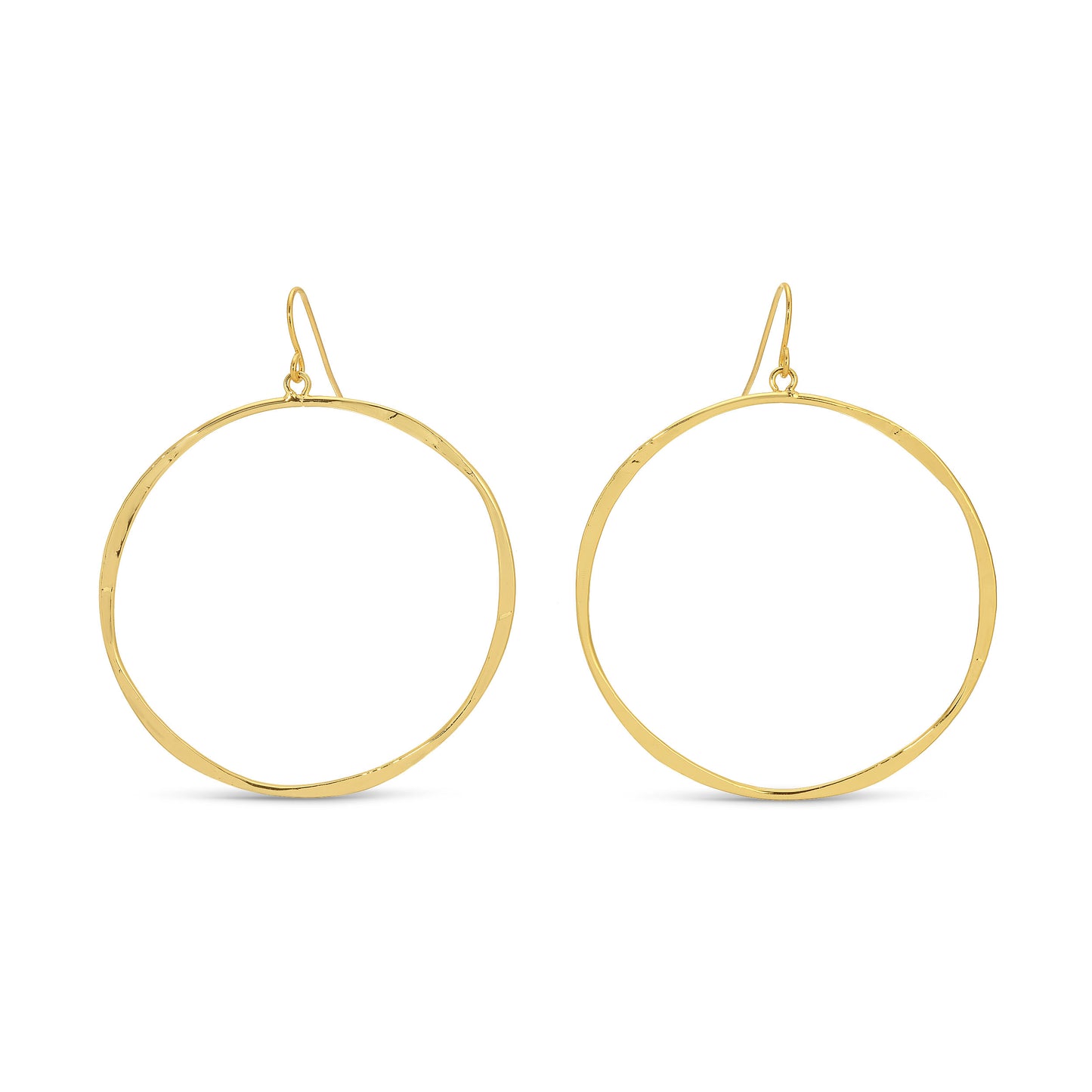 Gold hoop earrings on a white background