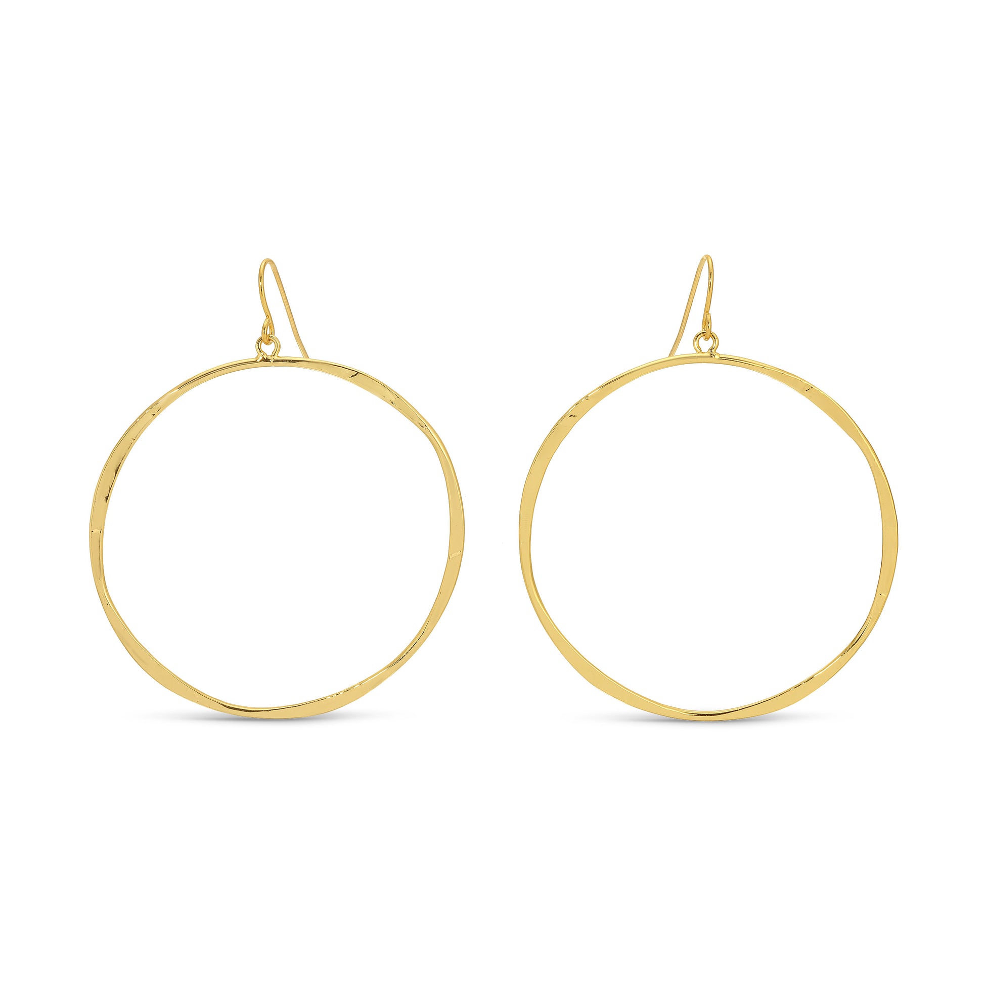 Gold hoop earrings on a white background