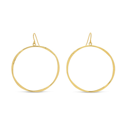 Gold hoop earrings on a white background