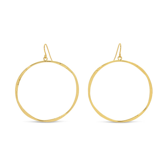 Gold hoop earrings on a white background