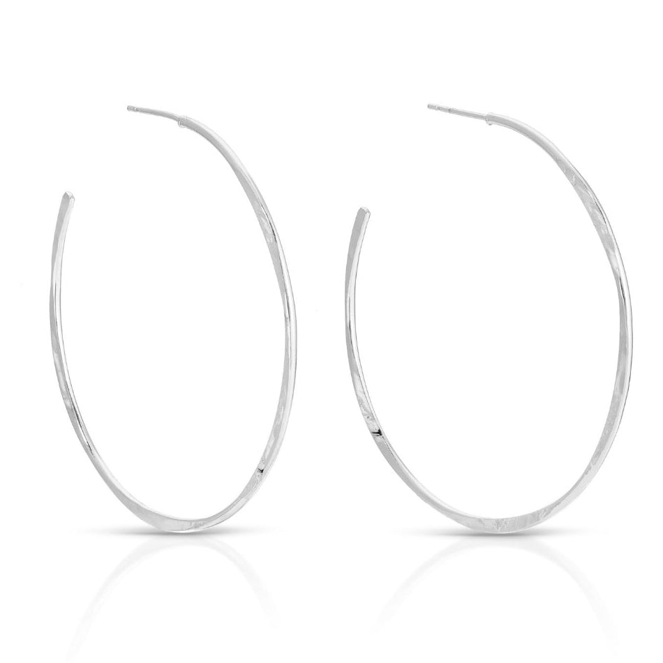 Silver hoop earrings on a white background