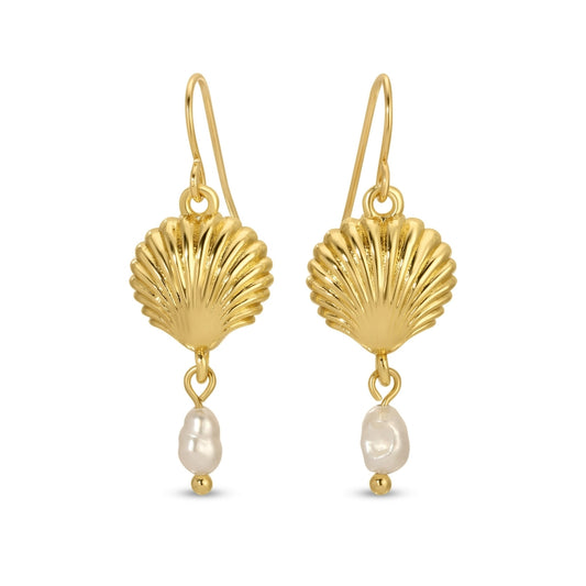 Gold shell earrings with pearl drops on a white background