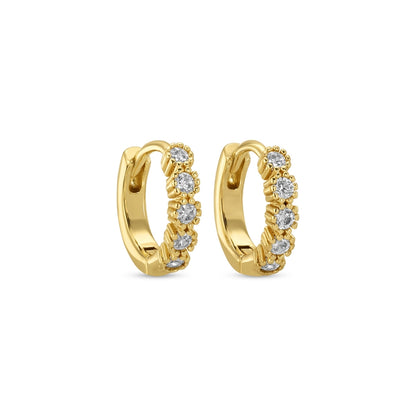 Gold hoop earrings with diamond accents on a white background