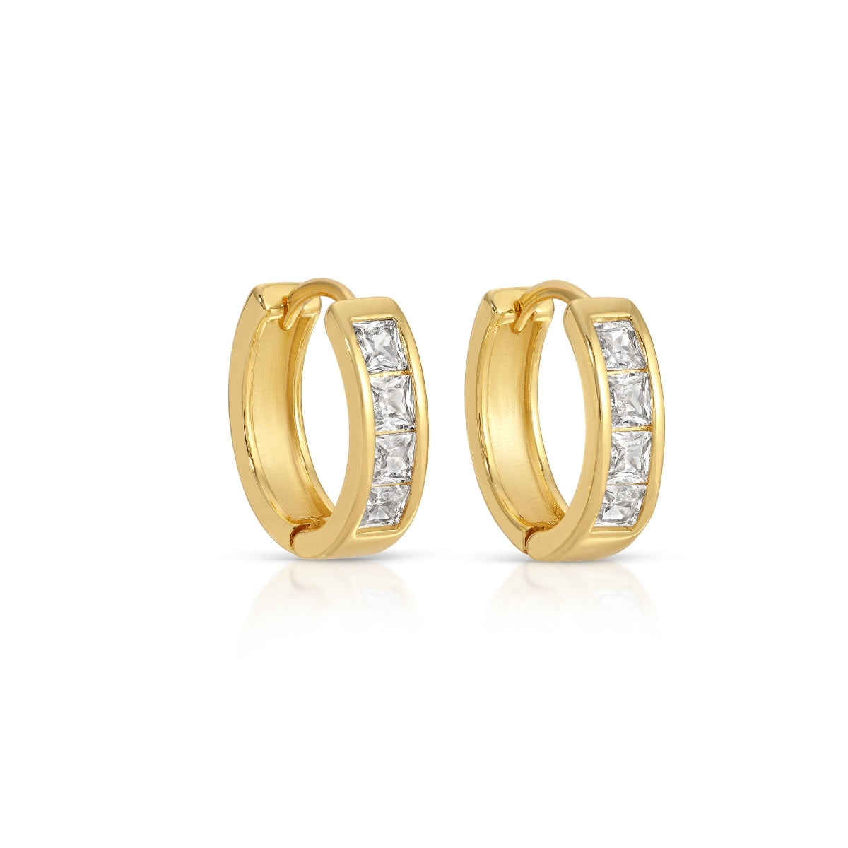 Gold hoop earrings with embedded diamonds on a white background