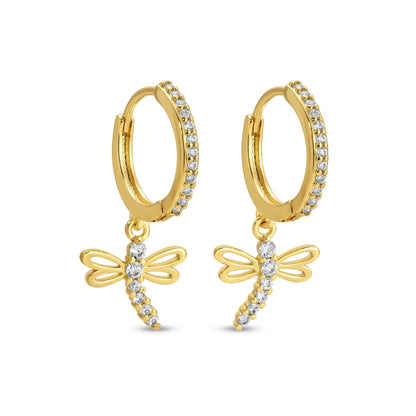 Gold hoop earrings with dragonfly charms on a white background