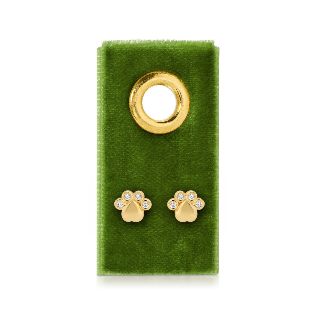 Gold paw print earrings on a green velvet card