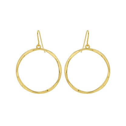 Gold hoop earrings on a white background
