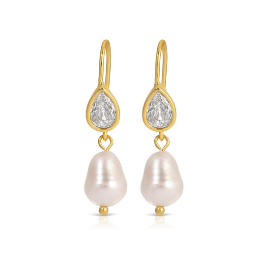 Gold earrings with pear-shaped gemstones and pearl drops on a white background