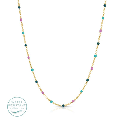Gold necklace with colorful beads on a white background, featuring 'Water Resistant' collection logo.