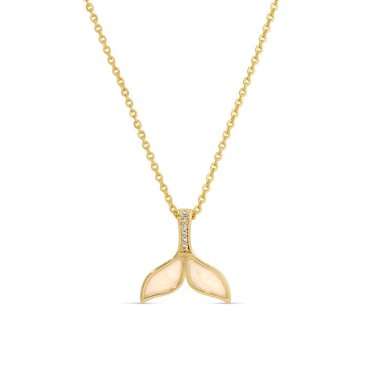 Gold necklace with a whale tail pendant on a white background