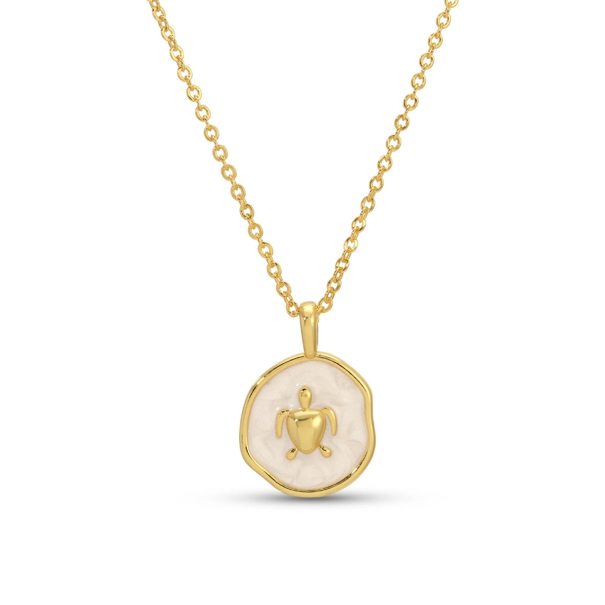 Gold necklace with a round pendant featuring a heart and figure on a white background