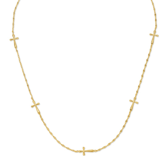 Gold necklace with small cross pendants on a white background