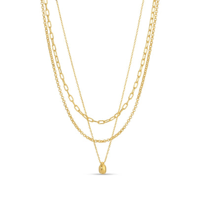 Two gold necklaces on a white background