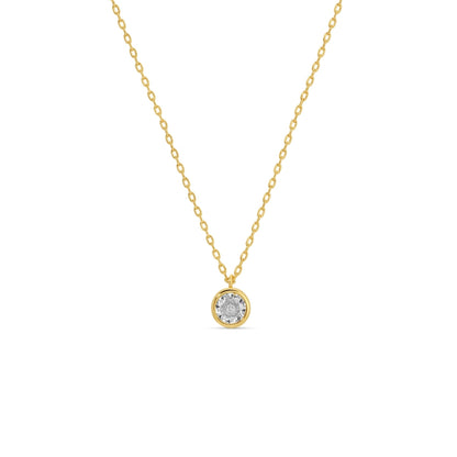 Gold necklace with a round pendant on a white background