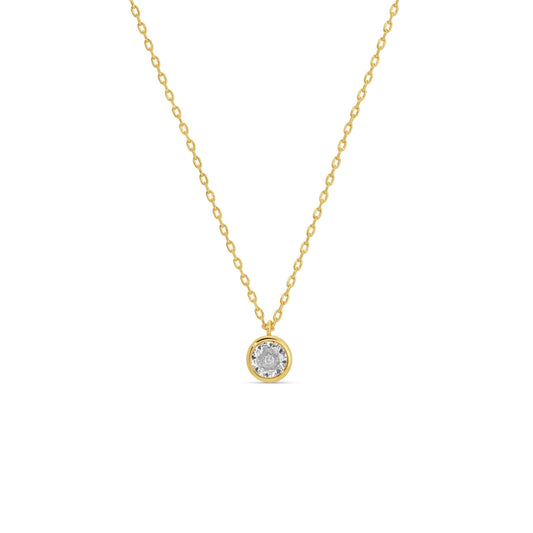 Gold necklace with a round pendant on a white background