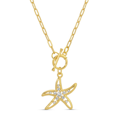 Gold necklace with a starfish pendant on a white background