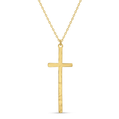 Gold cross necklace on a white background