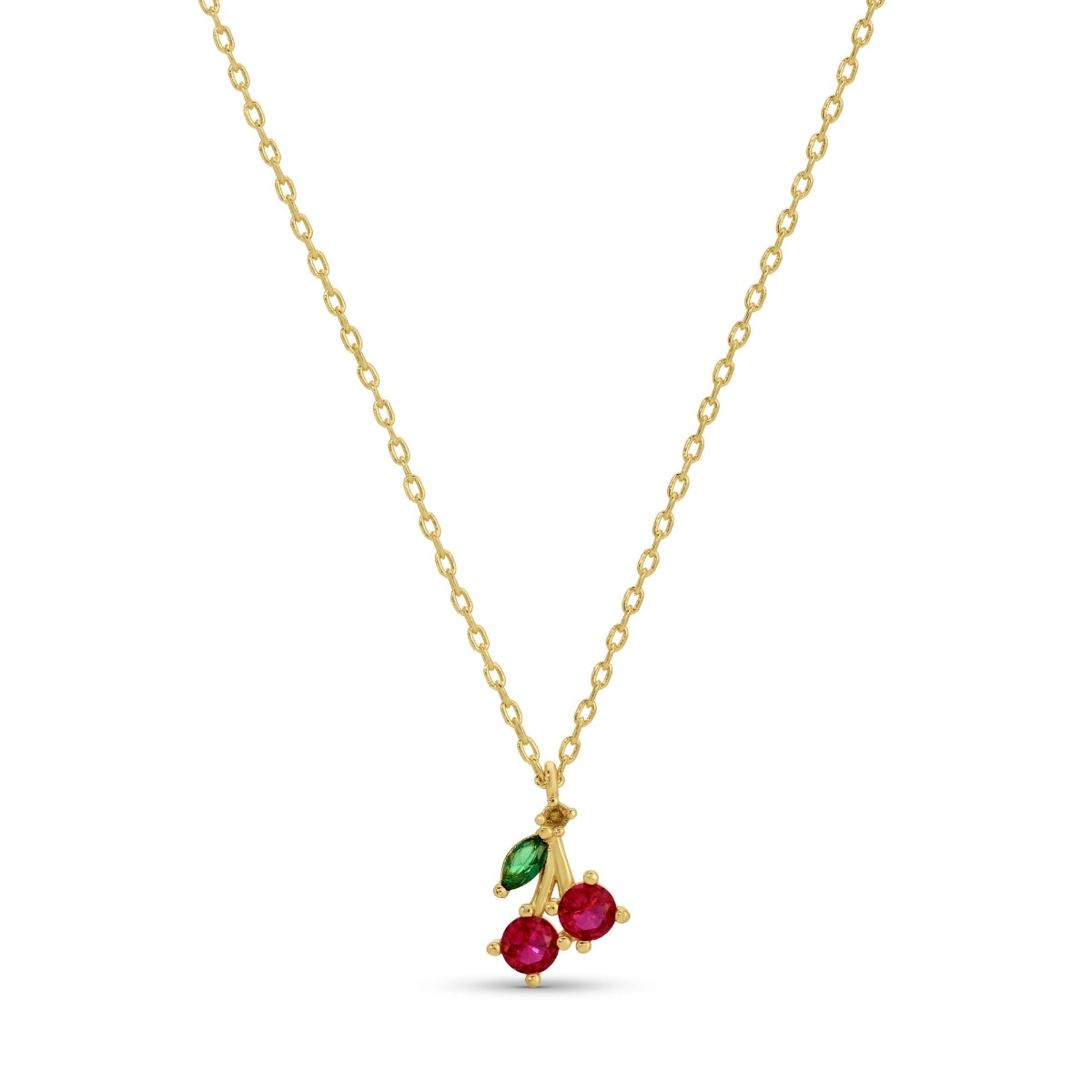 Gold necklace with red and green gemstones on a white background