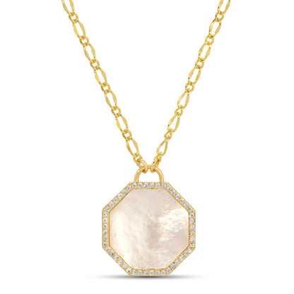 Gold necklace with a hexagonal pendant on a white background