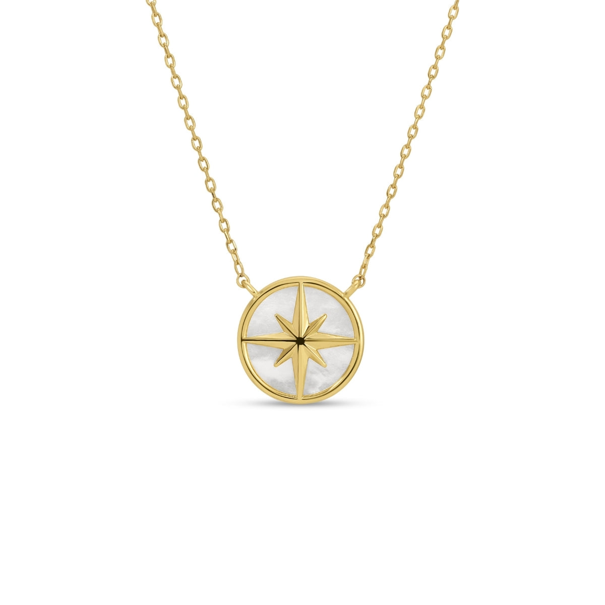 Gold necklace with a circular pendant featuring a star design on a white background