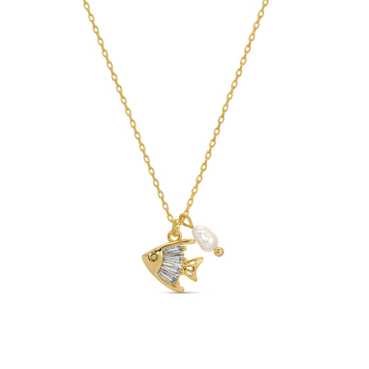 Gold necklace with a pendant featuring a bow and pearl on a white background