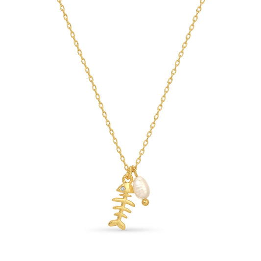 Gold necklace with fish bone and pearl pendant on a white background