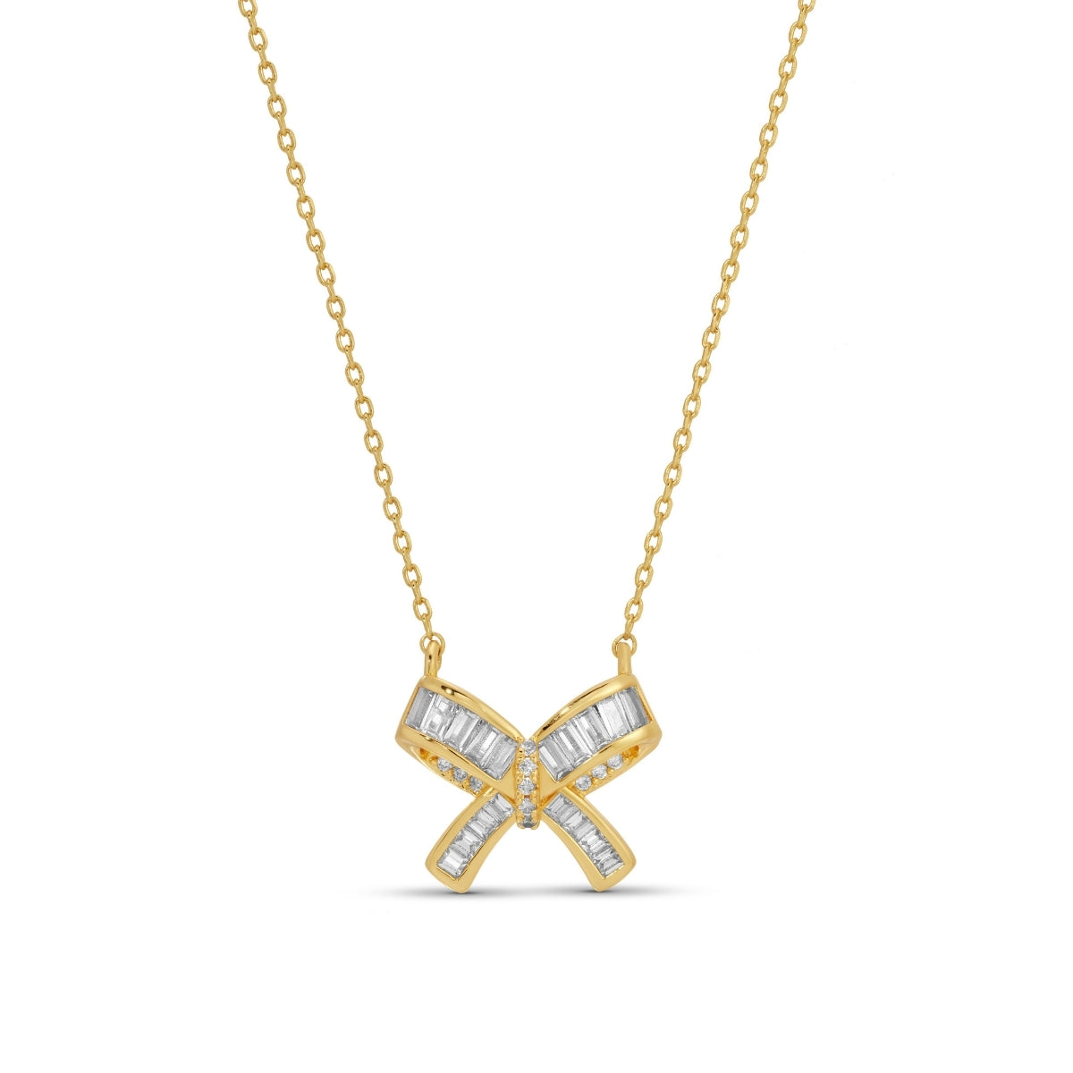 Gold necklace with a bow-shaped pendant on a white background