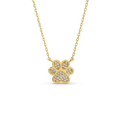 Gold necklace with a paw-shaped pendant on a white background