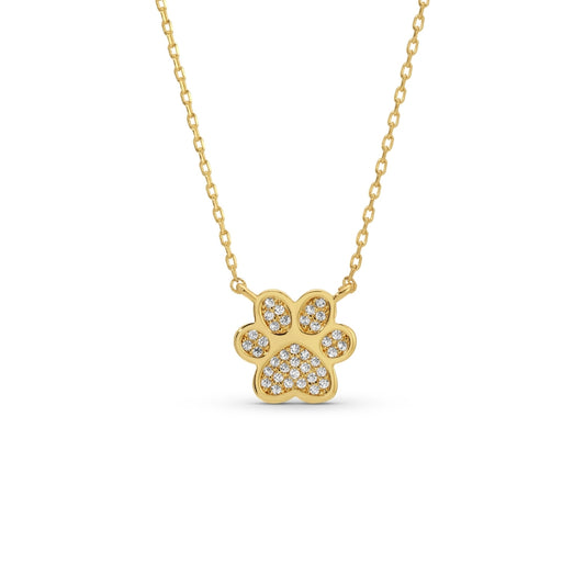 Gold necklace with a paw-shaped pendant on a white background