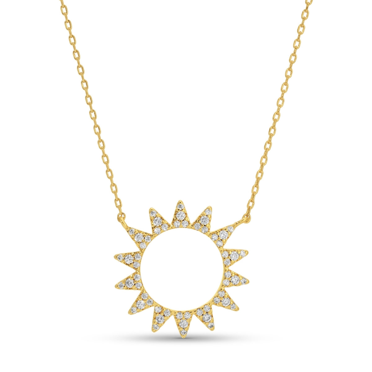 Gold necklace with a sun-shaped pendant on a white background