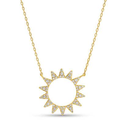 Gold necklace with a sun-shaped pendant on a white background