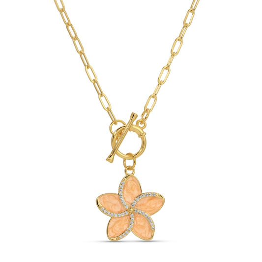 Gold necklace with a peach-colored flower pendant on a white background