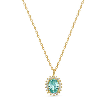 Gold necklace with a turquoise gemstone pendant on a white background