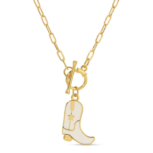 Gold necklace with a white cowboy boot charm on a white background