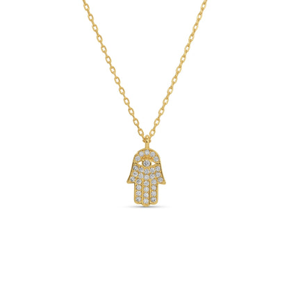 Gold necklace with a Hamsa hand pendant on a white background