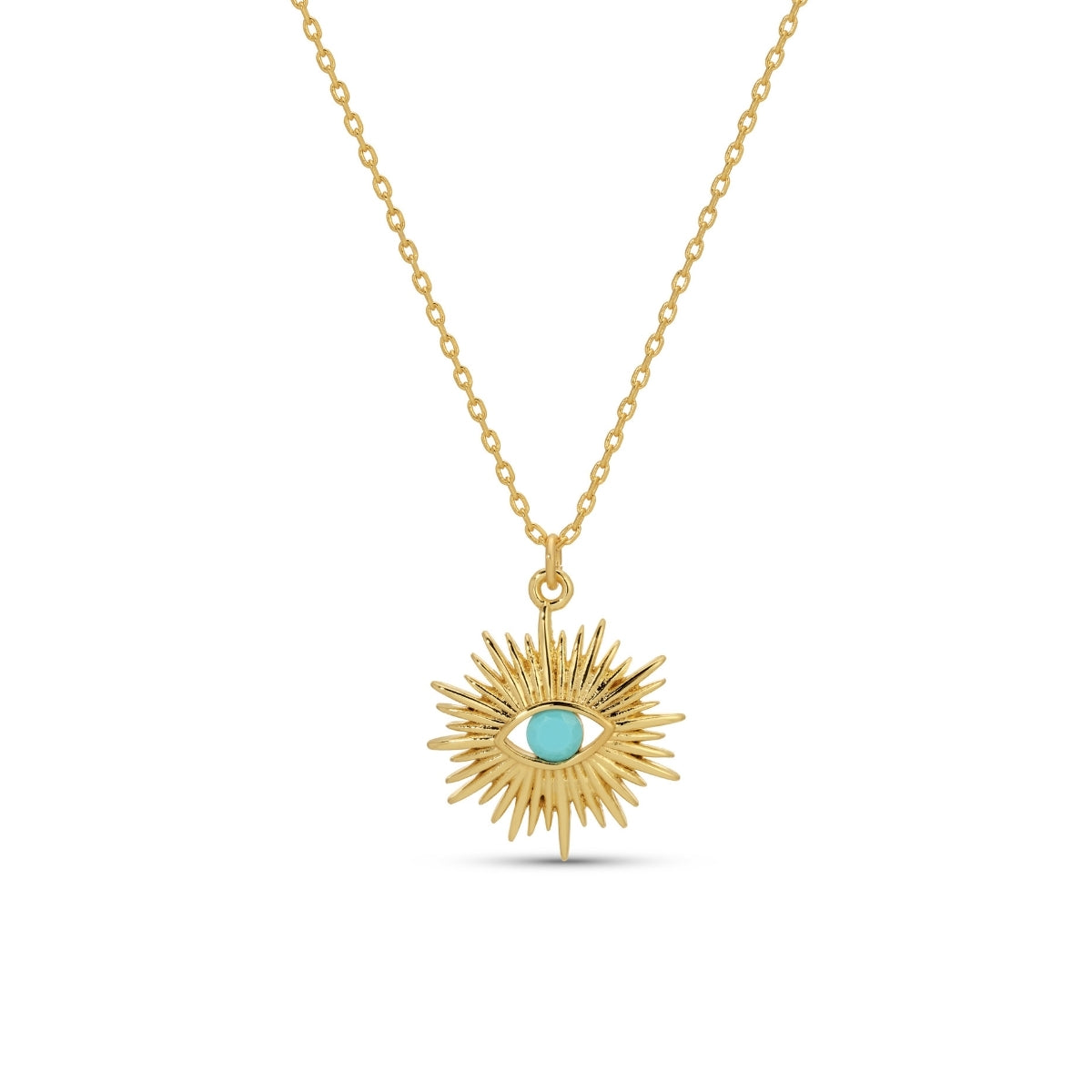 Gold necklace with a sunburst pendant featuring a turquoise stone on a white background