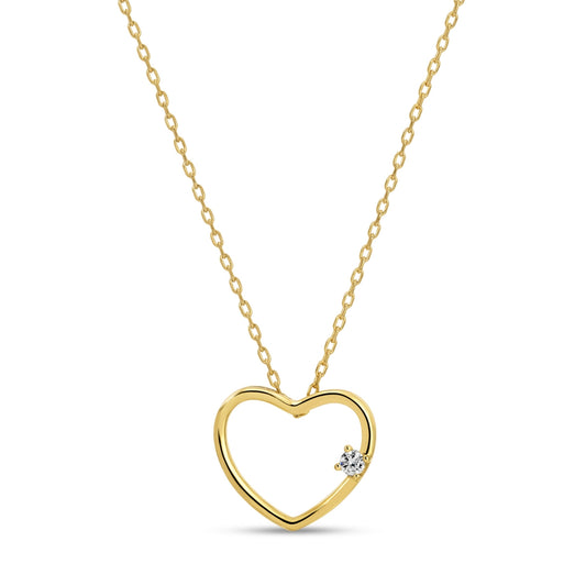 Gold heart-shaped necklace with a diamond on a white background