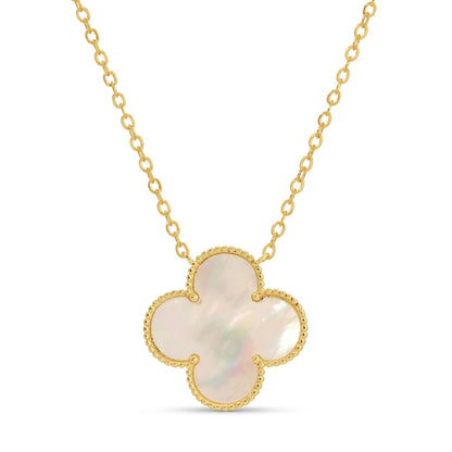 Gold necklace with a four-leaf clover pendant on a white background