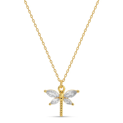 Gold dragonfly pendant necklace on a white background