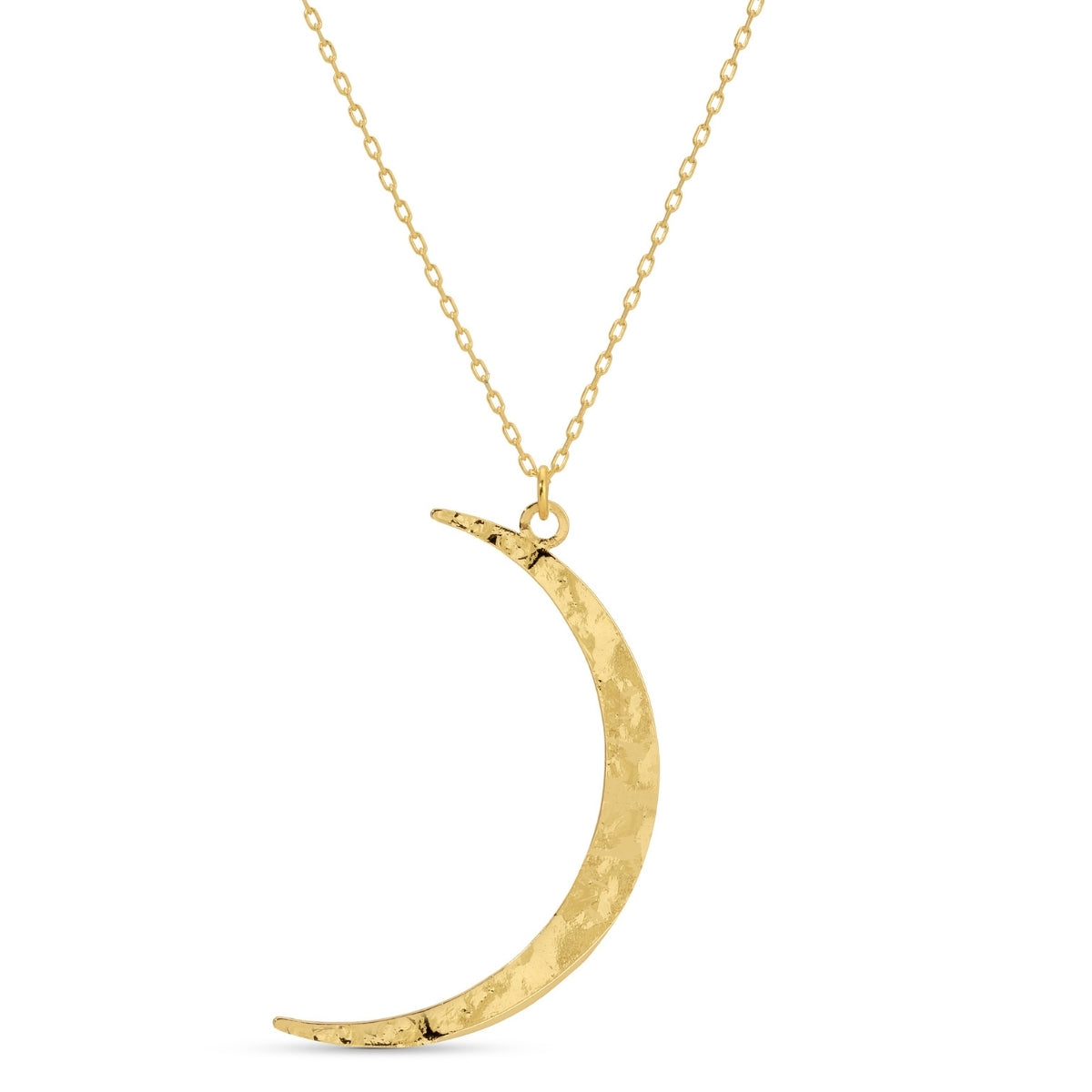 Gold crescent moon necklace on a white background